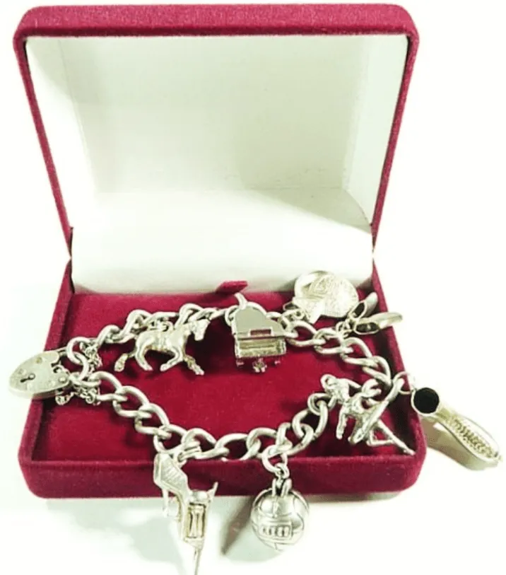 1974 hobbies / pastime themed vintage charm bracelet