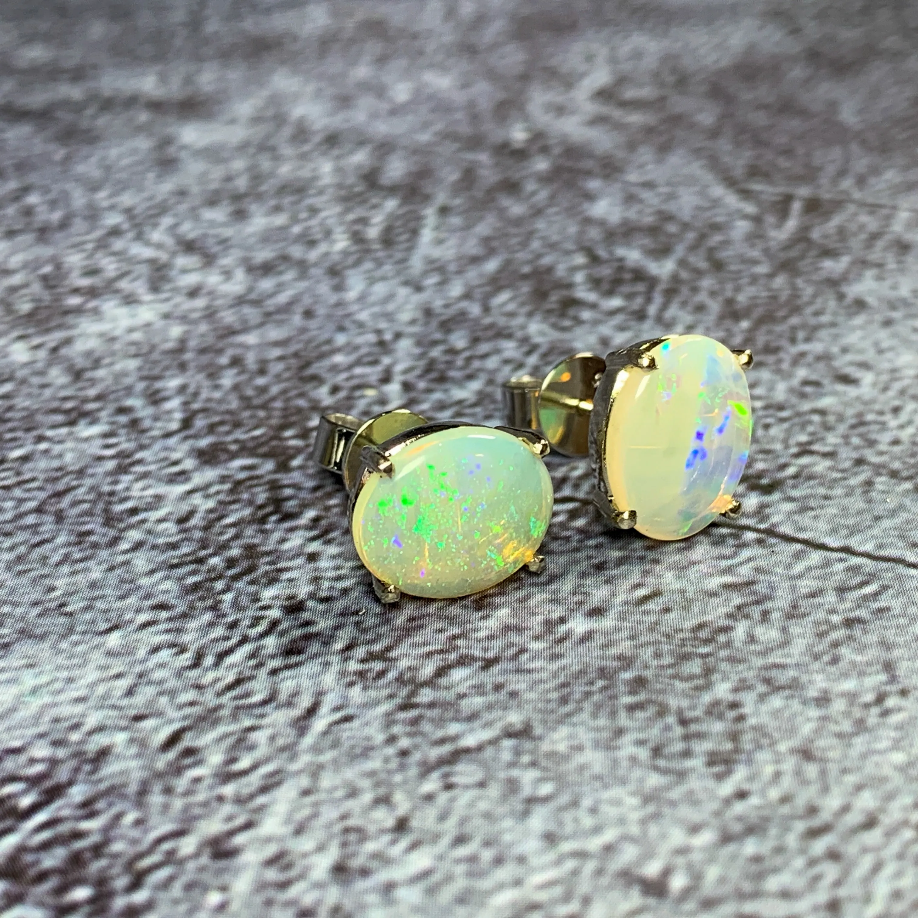 9kt White Gold Light Opal 10x8mm studs