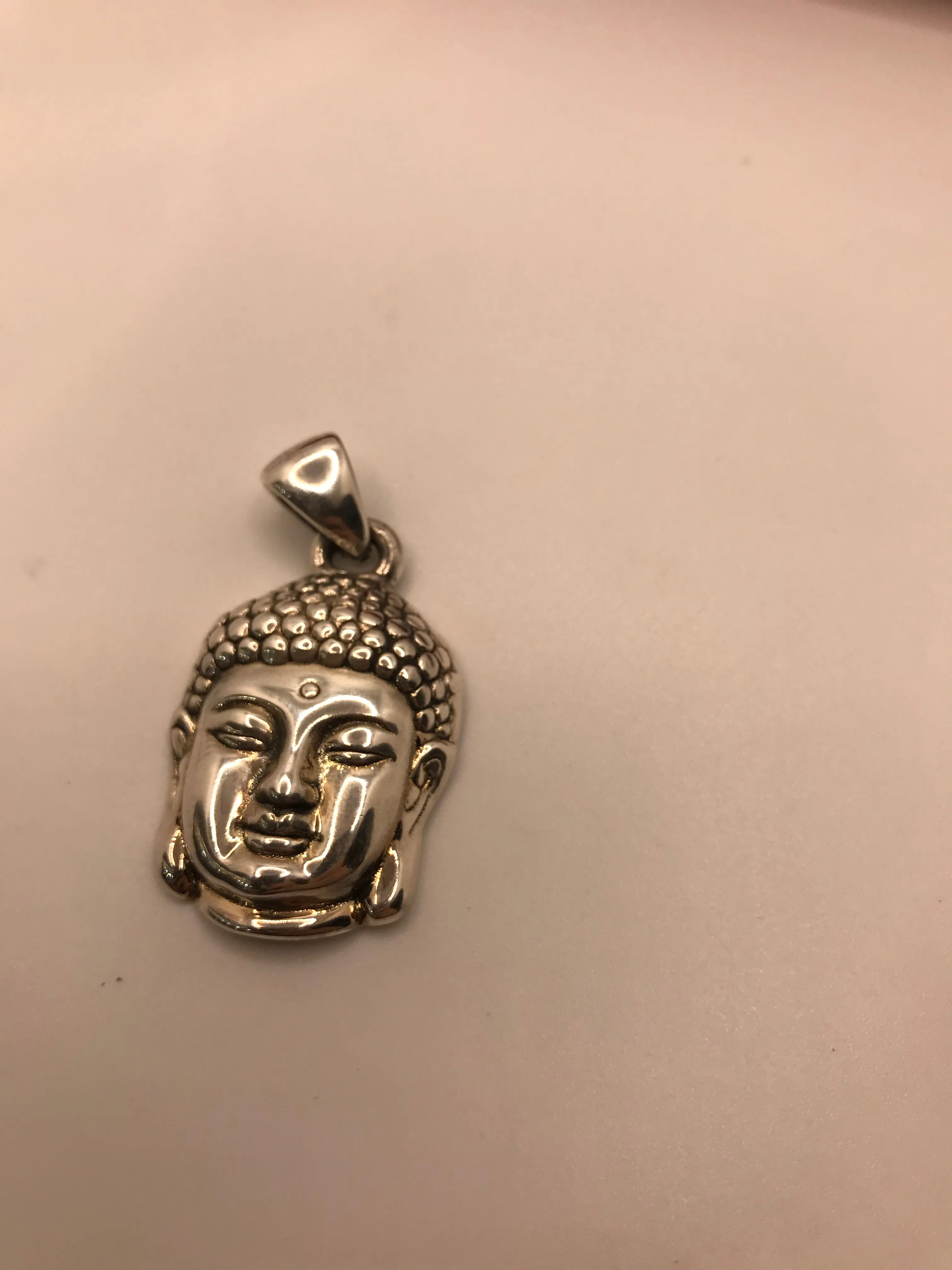 Sterling silver Buddha face pendant